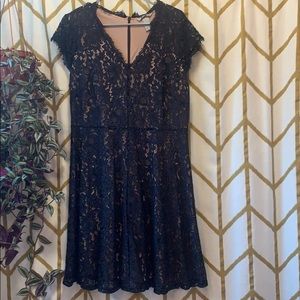 Lace dress with nude underlay